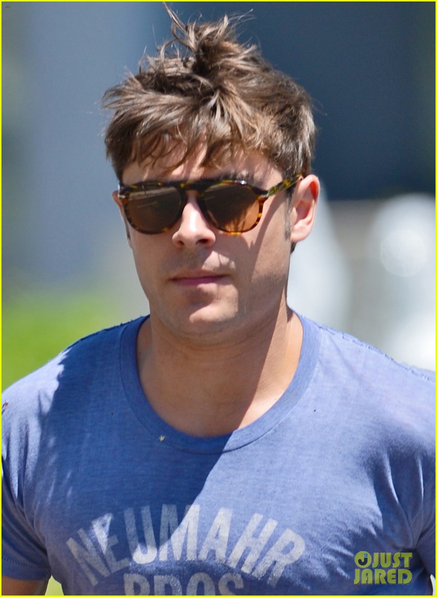 zac efron leaps into action for hotel entrance 032911013
