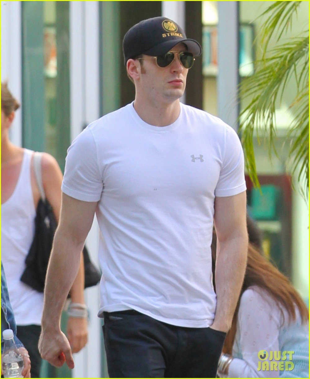 minka kelly grabs chris evans chest at the movies 052904765