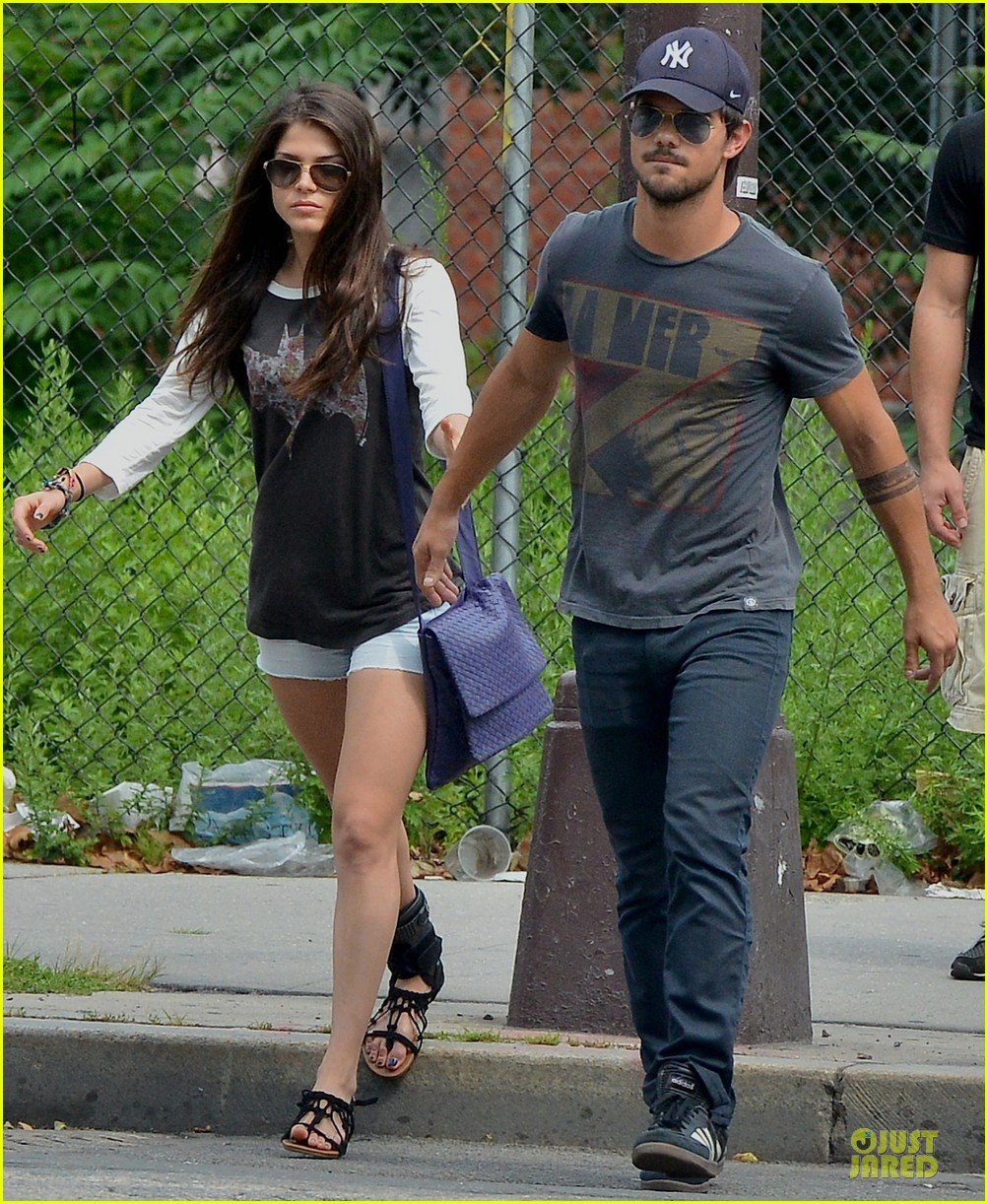 taylor lautner marie avgeropoulos holding hands as new couple 052919668