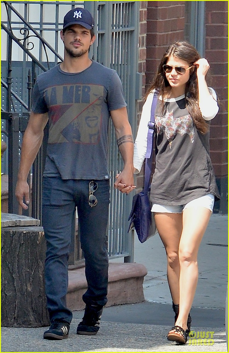 taylor lautner marie avgeropoulos holding hands as new couple 092919672