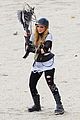 avril lavigne chainsaw action for rock n roll video shoot 01