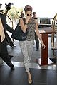 eva mendes flies out of los angeles 09