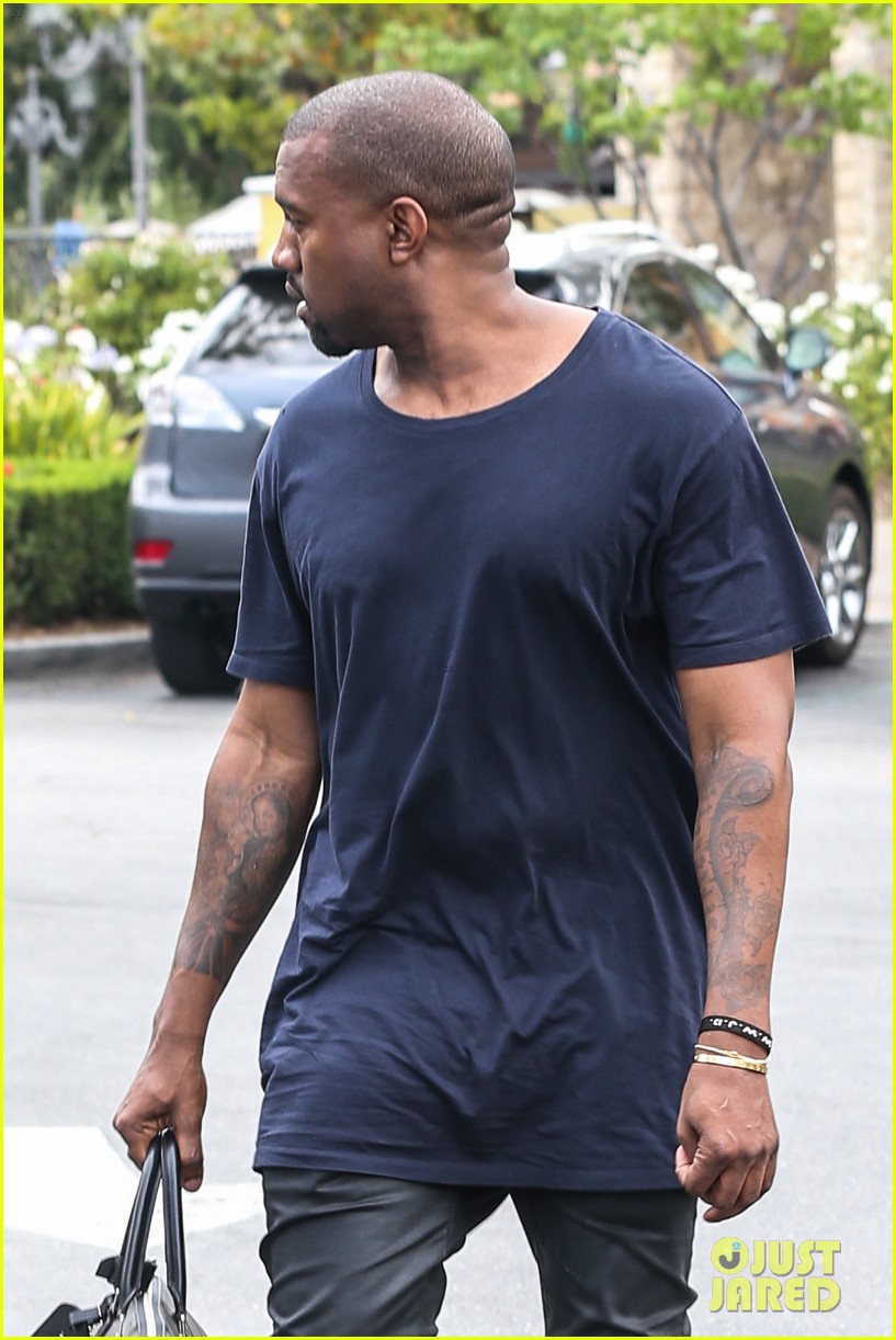 kanye west steps out solo after turning down north photo deal 022903342