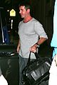 simon cowell gets to work after pregnancy reveal 04