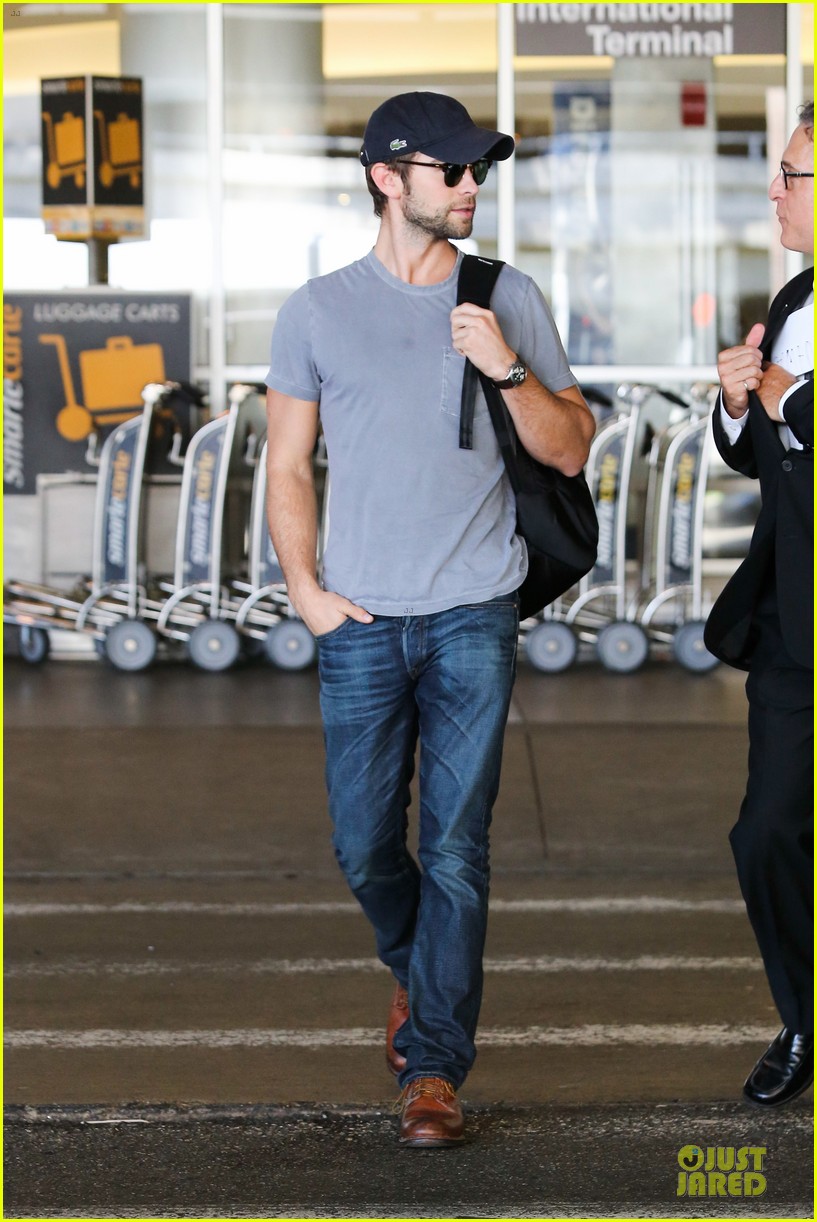 chace crawford backpack carrying stud at lax airport 13