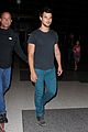 taylor lautner flies without marie avgeropoulos 01