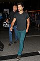 taylor lautner flies without marie avgeropoulos 05