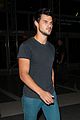 taylor lautner flies without marie avgeropoulos 07