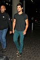 taylor lautner flies without marie avgeropoulos 09
