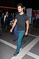 taylor lautner flies without marie avgeropoulos 12