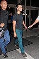 taylor lautner flies without marie avgeropoulos 13