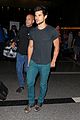 taylor lautner flies without marie avgeropoulos 15