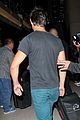 taylor lautner flies without marie avgeropoulos 19