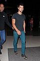taylor lautner flies without marie avgeropoulos 21