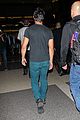 taylor lautner flies without marie avgeropoulos 23