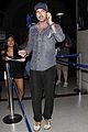 gerard butler lands in los angeles after long travel day 01