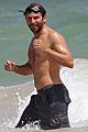 bradley cooper shirtless at the beach with suki waterhouse 03