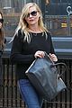 kirsten dunst shops for new sunglasses in nyc 02