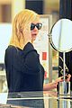 kirsten dunst shops for new sunglasses in nyc 04