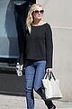 kirsten dunst shops for new sunglasses in nyc 05