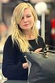 kirsten dunst shops for new sunglasses in nyc 07