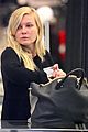 kirsten dunst shops for new sunglasses in nyc 18