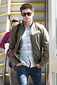 zac efron tom welling lax arrival after toronto film festival 08
