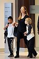 angelina jolie catches a flight with shiloh pax 01