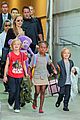 angelina jolie arrives in syd with all six kids 01