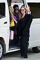 angelina jolie arrives in syd with all six kids 02