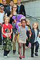 angelina jolie arrives in syd with all six kids 03