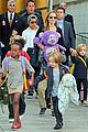 angelina jolie arrives in syd with all six kids 07