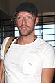 chris martin catches flight out of los angeles 02