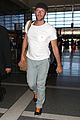 chris martin catches flight out of los angeles 03