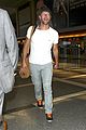 chris martin catches flight out of los angeles 06