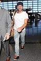 chris martin catches flight out of los angeles 10