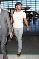 chris martin catches flight out of los angeles 12