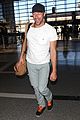 chris martin catches flight out of los angeles 13