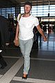 chris martin catches flight out of los angeles 15