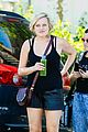 elisabeth moss wears leather shorts for film shoot 02