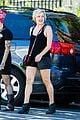 elisabeth moss wears leather shorts for film shoot 03