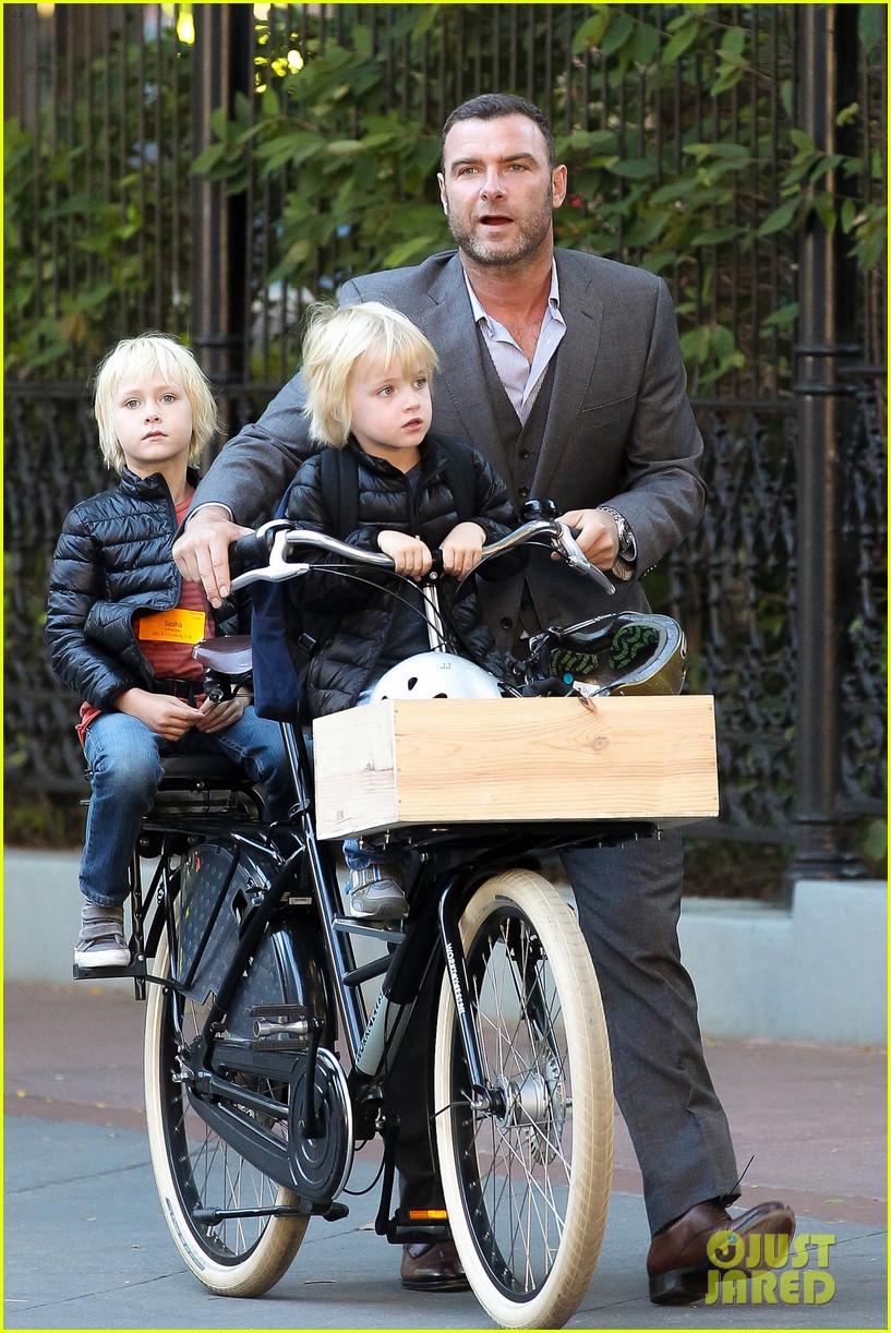 liev schreiber suits up for bike ride with his boys 10