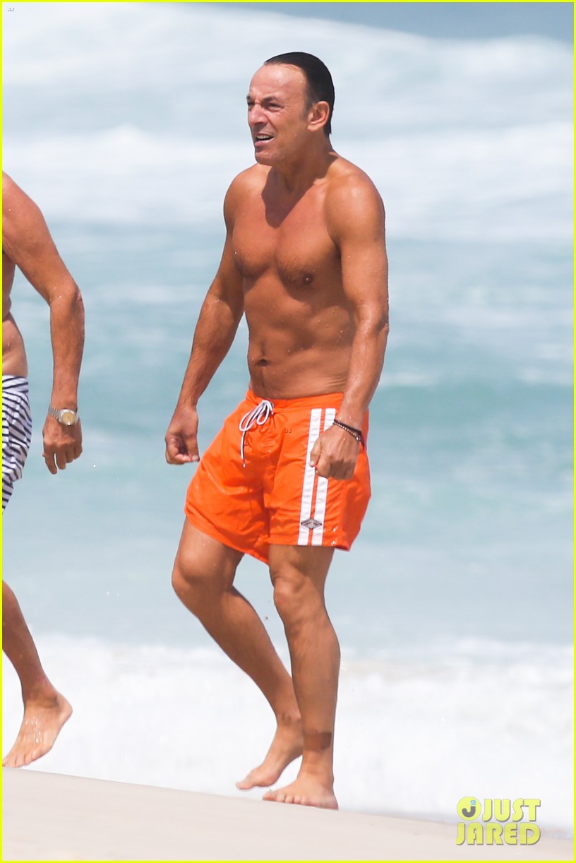 bruce springsteen bares fit shirtless body at the beach in rio 052957128