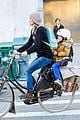 keri russel laughs with river after bike ride 03