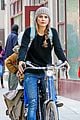keri russel laughs with river after bike ride 04