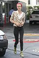 isabel lucas tends to her car at detail shop 04