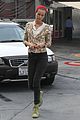 isabel lucas tends to her car at detail shop 09