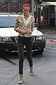 isabel lucas tends to her car at detail shop 10