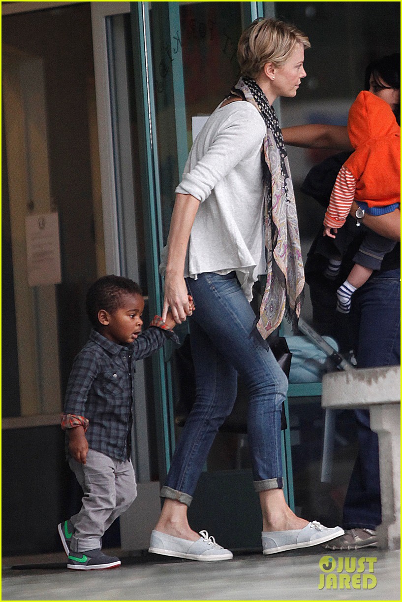 charlize theron holds on tight to son jackson 022969515
