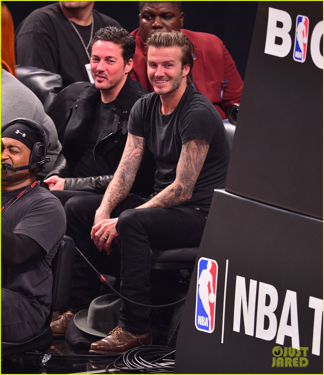 david beckham cheers on nets after flight into town 03